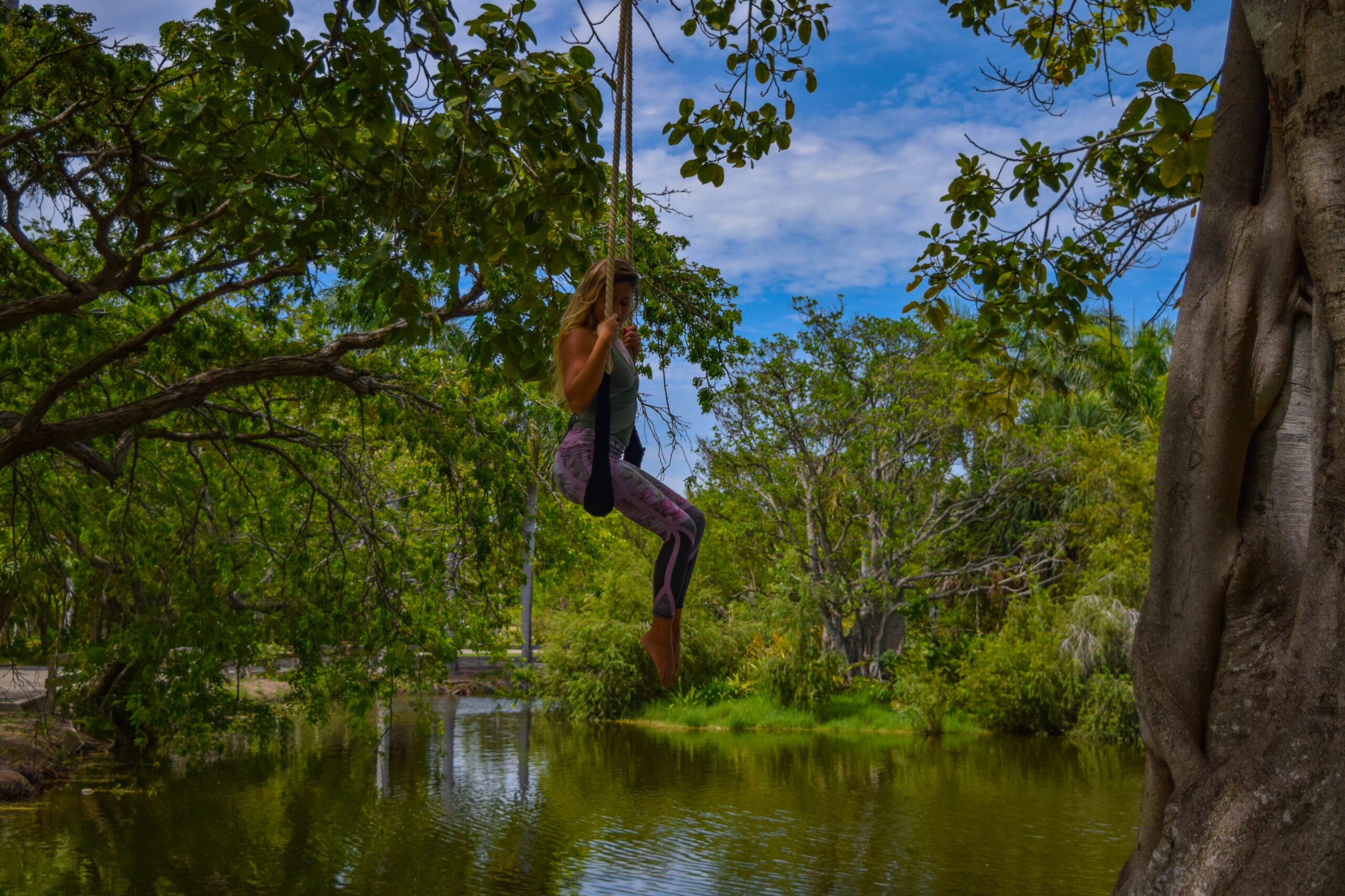 woman on swing in nature